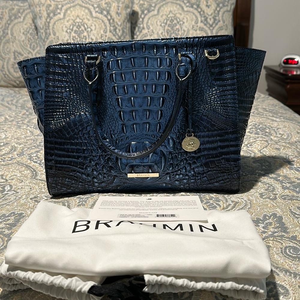 This is a lightly used Brahmin handbag.  It’s called maritime Melbourne